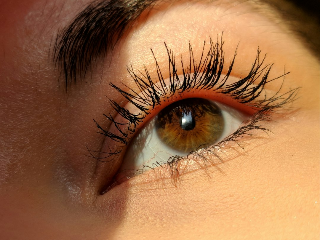 Close-up of a woman's eye showing curled lashes