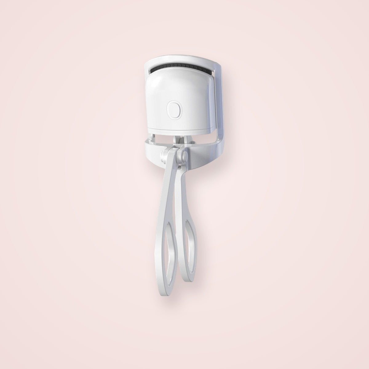 GlowCurl heated eyelash curler on blush studio background
